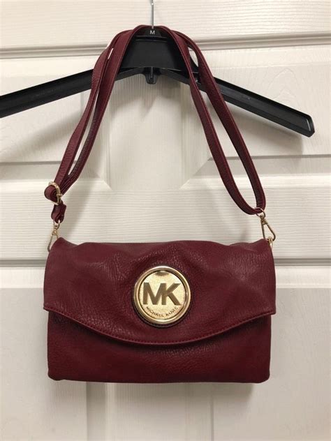 how to add a hole to michael kors purse strap|Michael Kors adjustable strap handbags.